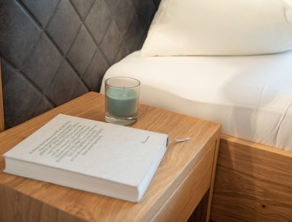 Book on the bedside cabinet © Lorenz Masser Photography