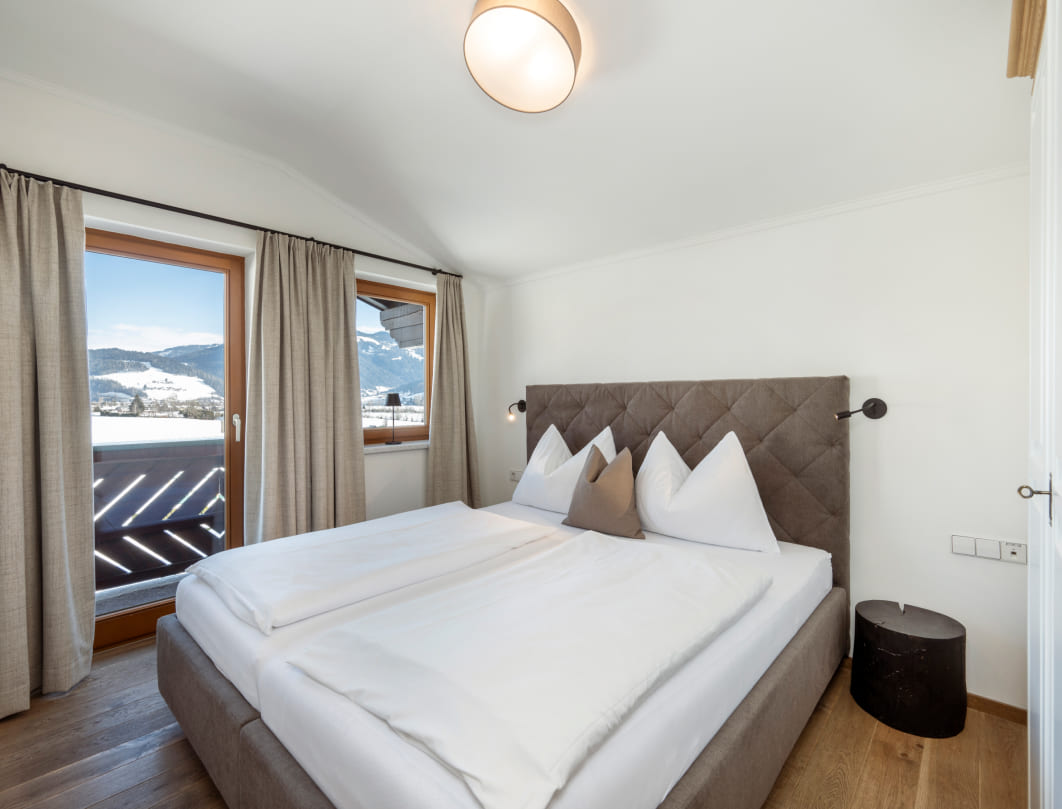 Gemütlicher Schlafbereich in der Ferienwohnung Sonnenblume © Lorenz Masser Fotografie